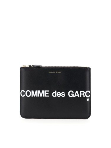 COMME DES GARÇONS...