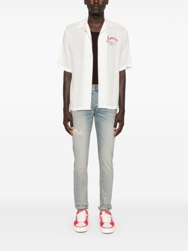 AMIRI SCRIPT LOGO SKINNY JEAN